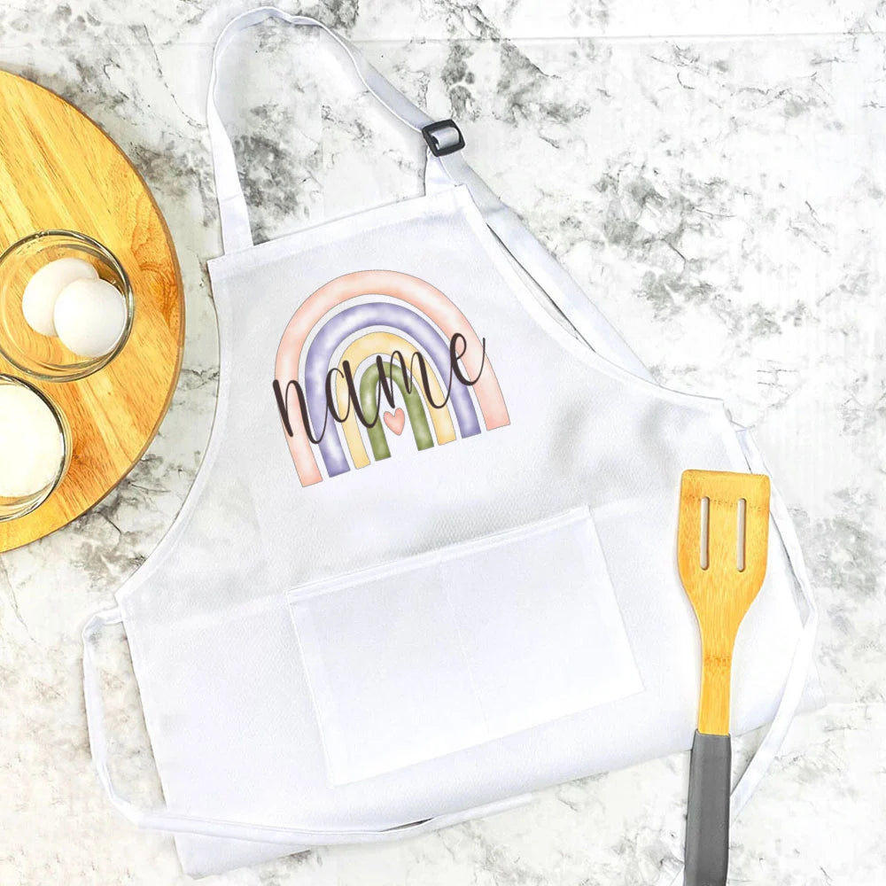 Personalisierte Kinderschürze mit Regenbogen-Motiven