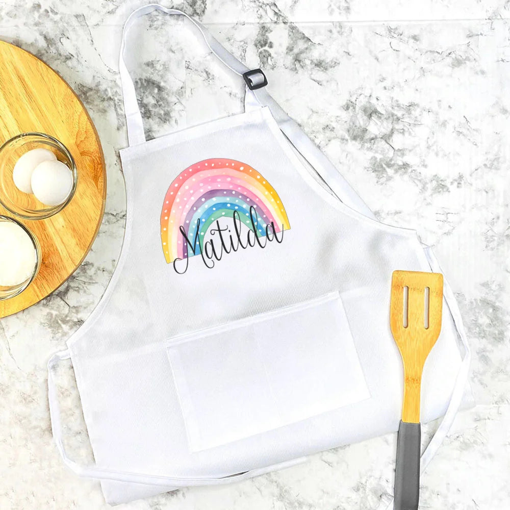 Personalisierte Kinderschürze mit Regenbogen-Motiven