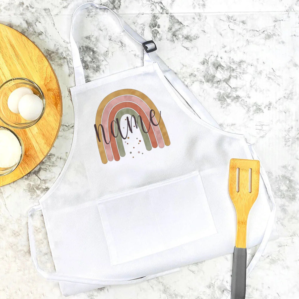 Personalisierte Kinderschürze mit Regenbogen-Motiven